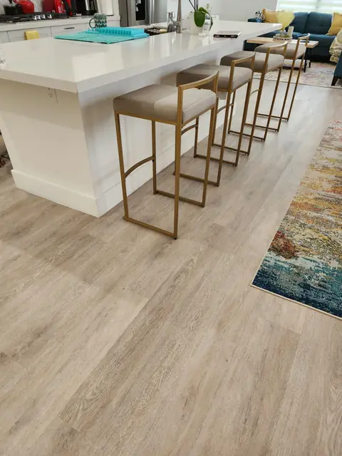 Kitchen island seating on newly installed LVP