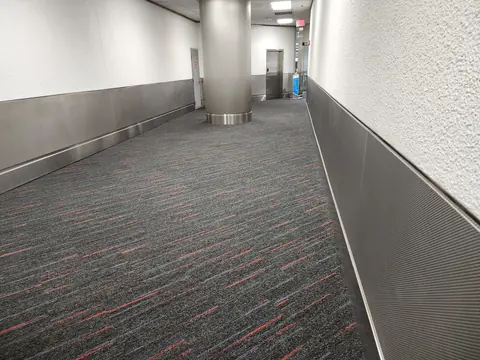 Concourse corridor at Miami International Airport with newly installed carpet tile