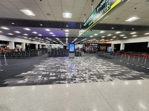Old carpet tile being removed from a Miami International Airport concourse