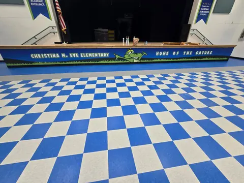 Checkerboard VCT installed up to the cafeteria stage