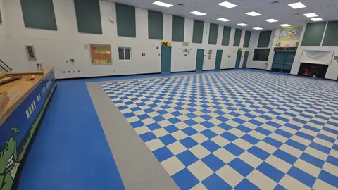 Precise VCT border lines in a school cafeteria