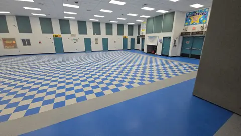 Cafeteria floor with new blue, white and gray VCT